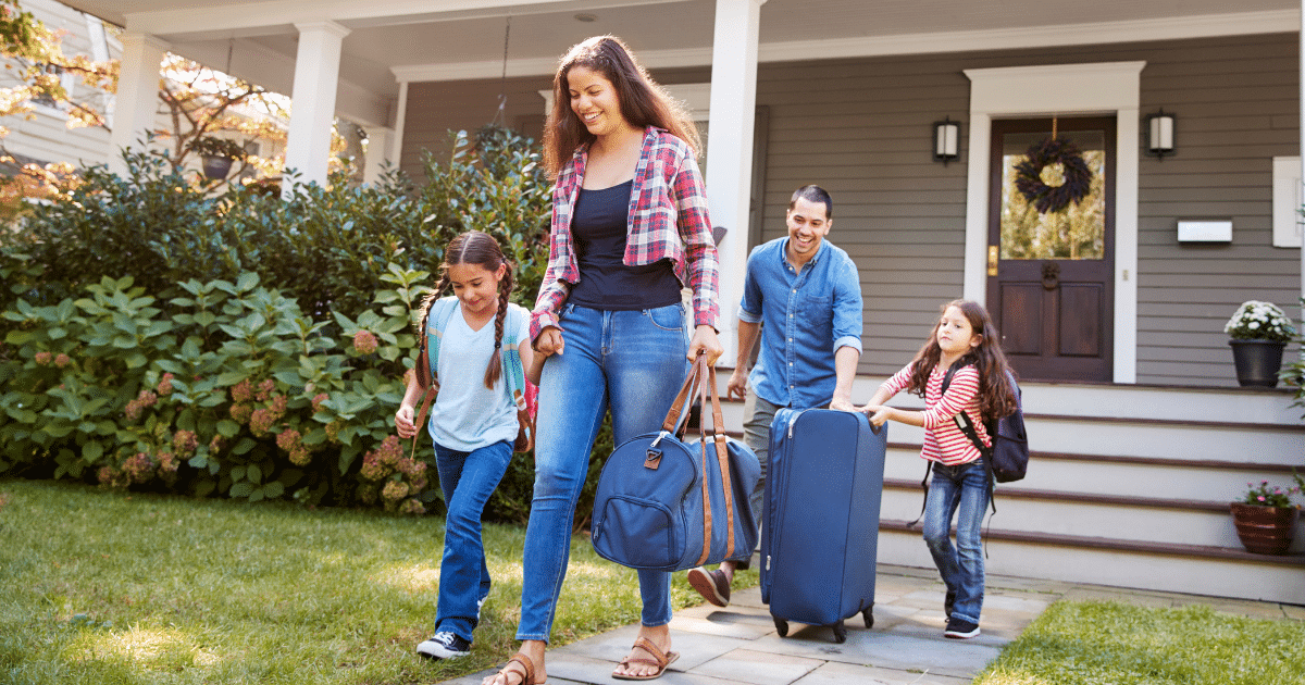 Family with two young children embarking on a trip