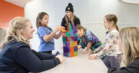 Child with autism engaging in group activities